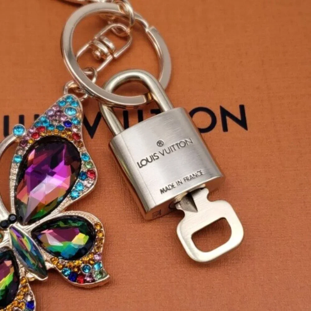 Authentic Louis Vuitton Gold Lock & Box w/ Unbranded Butterfly Bagcharm 122725